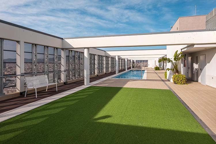 Enhances outdoor spaces with natural-looking, durable greenery perfect for residential landscapes.