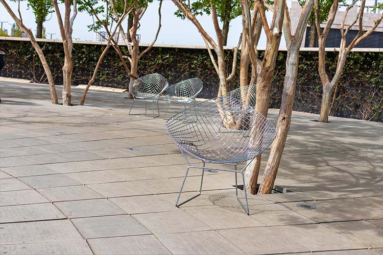 Enhancing outdoor patios with durable, stylish, and weather-resistant tile finishes.