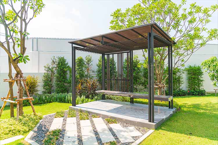 Designing and constructing stunning outdoor shade structures for relaxation and gatherings.