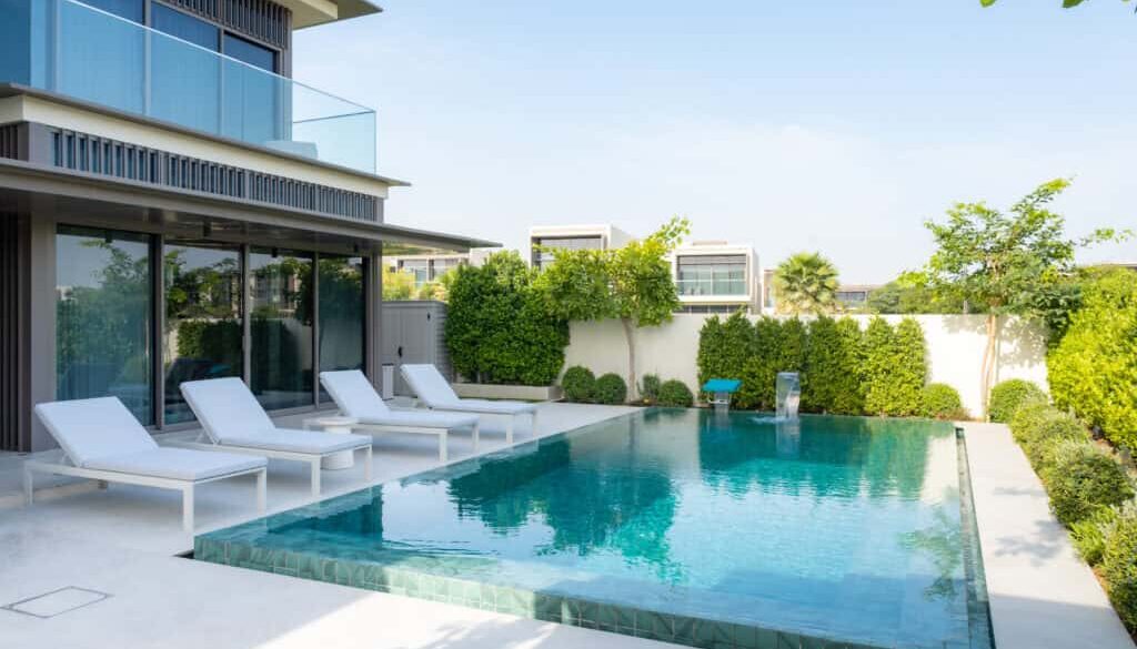 Landscaped villa exterior with garden greenery and finished outdoor design