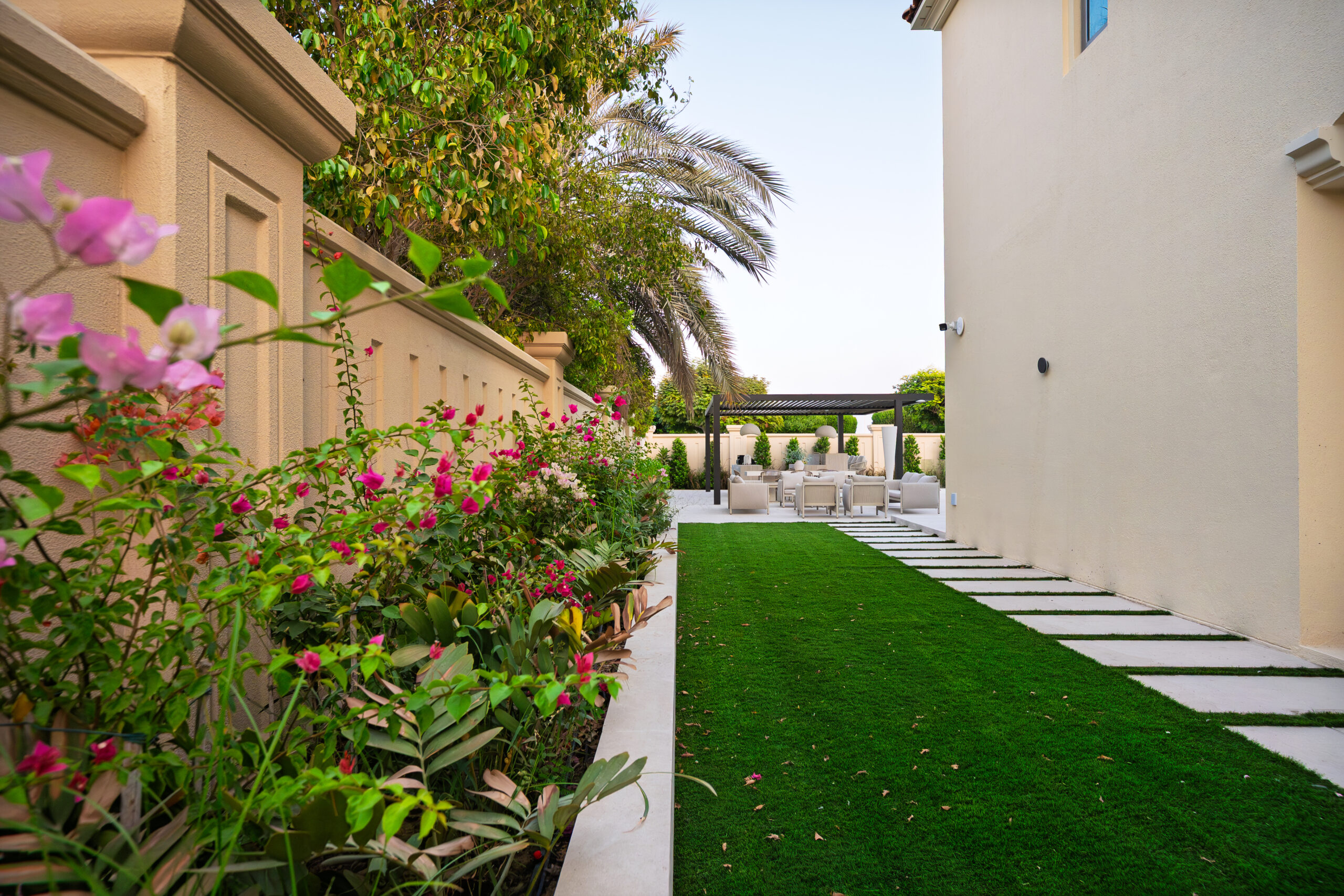 Add greenery, shade and texture with lawns, trees, shrubs and flower beds selected for the site conditions. Our team plans planting combinations that complement the property and suit local heat and irrigation needs, helping create an inviting garden without unnecessary upkeep.